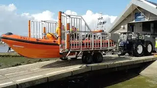 Mudeford Lifeboat being recovered by a submersible tractor from Christchurch harbour