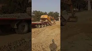 Excavator Unloading #taler #excavator #haighway #work #cat #machine #powerful #project #viral