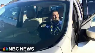 High school volleyball team surprises custodian with car