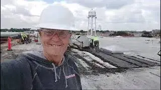 The owner of the roofing company, called AMSTERDAM - ROOFING. Commercial roofing job.