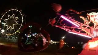 Heart Flip Ride and Neon Lights at Lakeside Amusement Park