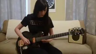 Noveller playing with Guitar Triller