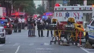 NYC officer among the 5 killed in deadly shooting at Manhattan office building