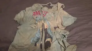 Ripping up Hatsune Miku tie-dye shirt