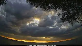 Turbulent Skies Across Green Bay at Sunset