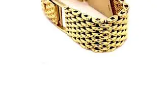 A MOVADO GOLD WRISTWATCH
