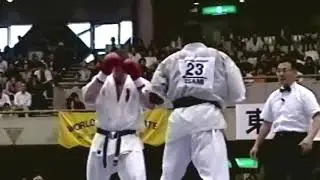 Kyokushin. Kumite full contact with boxing gloves.