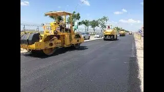 GROUP SAKAI ROLLER WORKING ON ROAD CONSTRUCTION