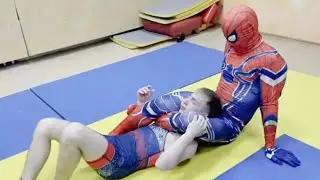 Spider-Man in a Grappling Match​Web-Slinger Secures the Submission​Unexpected Sparring Partner