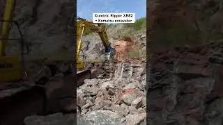 Xcentric Ripper XR82, hydraulic ripper, breaking stone with a Komatsu excavator.