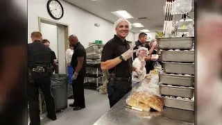 Local police officers help feed hungry kids
