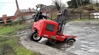 Moffett truck-mounted forklift goes swimming - dive, dive dive!