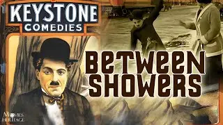 Charlie Chaplin Between Showers (1914)
