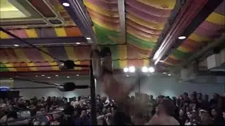 Jungle boy Jack Perry hits a castaway moonsault to the outside 