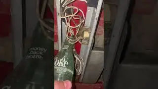 1973 inside and it works Coca Cola vending machine