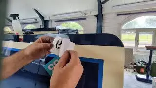 How to fit a vinyl boat registration numbers using the centre hinge method (dry)