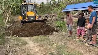 Mountain Village Narrow Road Leveling off-JCB Backhoe