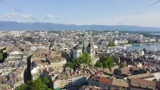 Geneva, Switzerland. Flight over the city. Geneva Cathedral, Aerial View Hyperlapse, Point of intere