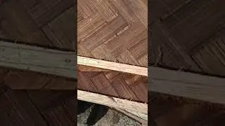 A partition made of woven bamboo for feeding bees.