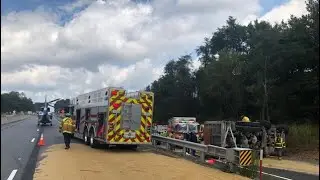 Chopper lands on I-83 after dump truck crashes, spills sand all over road