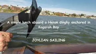 A simple lunch on board a Heron dinghy at anchor in Kogarah Bay.