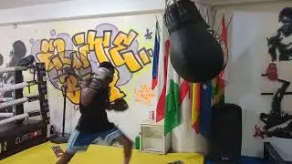 Amateur Boxers doing the bag work (Punching Bag) Aberegidi Ebi and Richard Emmanuel China