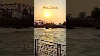 Haridwar magic: Ganga's flow, prayers' glow.#spiritualjourney #haridwar #ganges #devbhoomi  #shorts