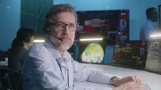 Portrait of flight control operator in command center