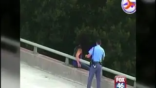 Police officer saves bridge jumper