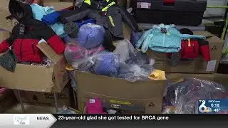 The Moline Breakfast Optimist Club gives donates winter clothes to area students