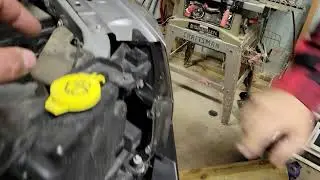 2009-2018 Ram 1500 hidden headlight adjustment