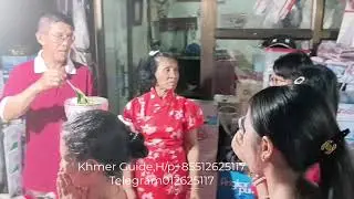 Parents bless their children with water during Khmer Chen New Year in Cambodia
