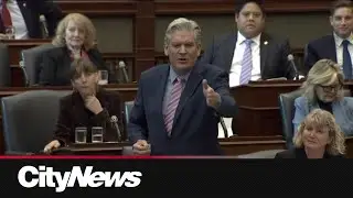 Premier fires back after liberals accuse him of neglecting students, starving education