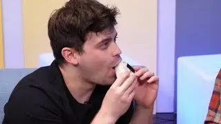 damien eating onigiri while making direct eye contact with shayne