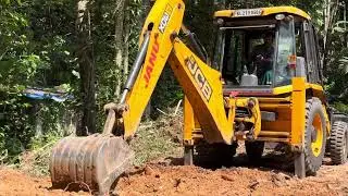 Jcb 3dx digging soil and preparing land for cultivation 