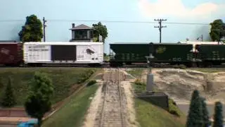 A D&RGW mainfest freight bangs across the diamonds in Lower LaSalle - EMRRC