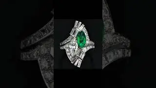 Stunning ring in geometric design, featuring a vibrant marquise-cut emerald💚 and a marquise diamond!