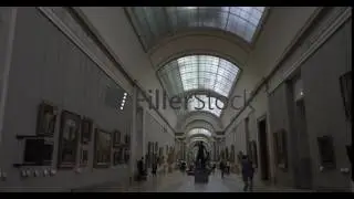 Louvre hall with paintings and sculptures