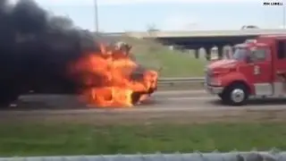 This bus is on fire... and rolling downhill!