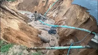 Bad storm caused washout &mdash;- Drone video of repair and idiot building his house right there 