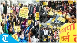 AAP activists hold protest outside BJP office in Delhi