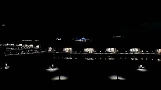 Nighttime view of Magic Kingdom from the Polynesian longhouses