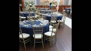 Navy blue and champagne wedding decoration with hints of gold, beige and white.