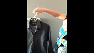 Silly Baby Laughing at a Shirt