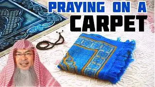 Can we pray on a carpet where our forehead may not touch the ground? - Assim al hakeem