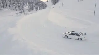 DRONE VIEW On Cr&eacute;vacol Ice Track Panorama With Mitsubishi Lancer - (4K UltraHD)