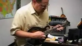 Charlie Derrington plays a Loar