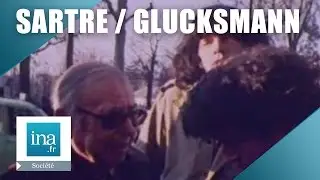Jean-Paul Sartre et Andr&eacute; Glucksmann manifestent devant l'ambassade d'URSS | Archive INA