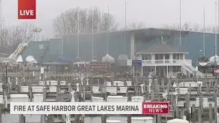Firefighters tending to fire at Safe Harbor Great Lakes Marina