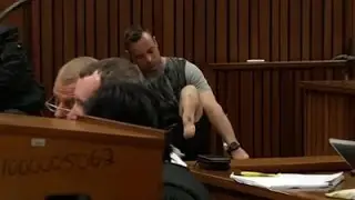Raw: Pistorius Removes Prosthetic Legs in Court